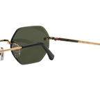Gafas de sol con montura dorada y lentes verdes, estilo moderno y elegante para protección visual.